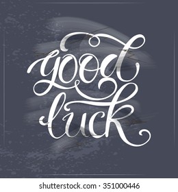 Good luck lettering on blackboard. Good luck text lettering for invitation and greeting card, prints and posters.Hand drawn typographic inscriptions
