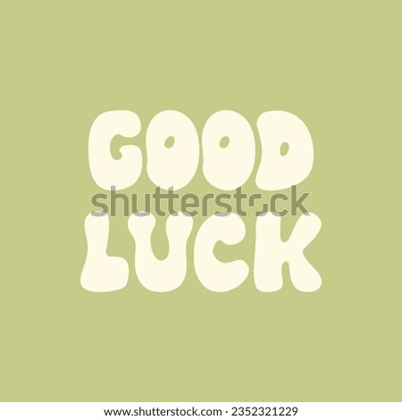 Good luck lettering phrase. Vector illustration in retro groovy style