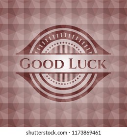 Good Luck red seamless emblem with geometric background.