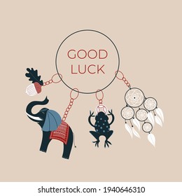 Good luck wish phrase with protection, luck and fortune charms or talismans as keychains. Fortune wish card. Fortune and success charms, lucky amulets. Elephant, dreamcatcher, frog, acorn