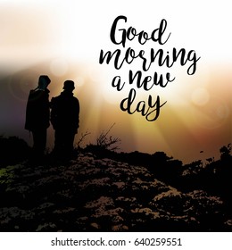 Good morning a new day. Dawn landscape with two persons and phrase