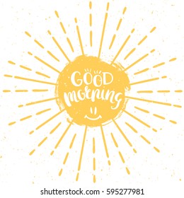 Good morning. Vector hand drawn lettering with sun and vintage sunburst. Inspirational poster.