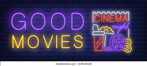 Good movies, cinema night neon sign. Popcorn box, takeaway drink, film reel, ticket on brick wall background. Vector illustration in neon style for film clubs