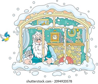 Good old magician and his little kitten looking out of a window in their old village house from a fairy tale on a snowy and cold winter day, vector cartoon illustration isolated on white