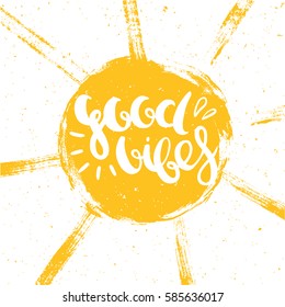 Good vibes lettering on a sunny background, vector illustration.