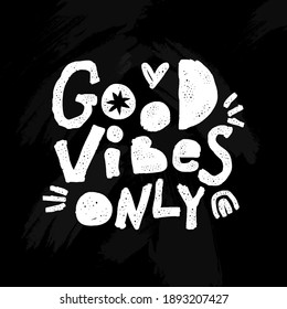 Good vibes only. Chalk lettering on black board. Inspirational quote.