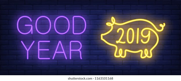 Good year neon text with pig. New Year day and Christmas design. Night bright neon sign, colorful billboard, light banner. Vector illustration in neon style.