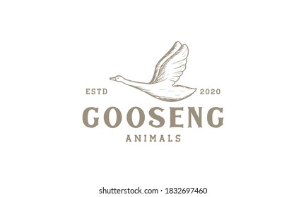 goose fly engraved vintage logo vector illustration design