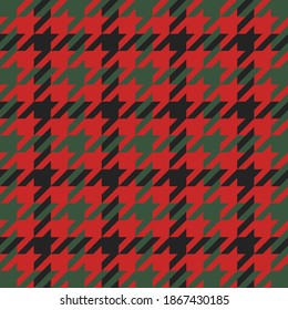 Goose foot. Christmas Pattern of crow's feet in red and black cage. Glen plaid. Houndstooth tartan tweed. Dogs tooth. Scottish checkered background. Seamless fabric texture. Vector illustration