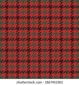 Goose foot. Christmas Pattern of crow's feet in red and black cage. Glen plaid. Houndstooth tartan tweed. Dogs tooth. Scottish checkered background. Seamless fabric texture. Vector illustration