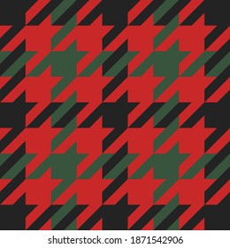 Goose foot. Christmas Pattern of crow's feet in red and green cage. Glen plaid. Houndstooth tartan tweed. Dogs tooth. Scottish checkered background. Seamless fabric texture. Vector illustration