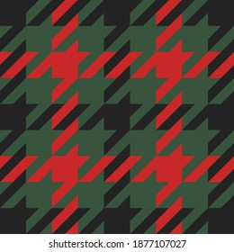 Goose foot. Christmas Pattern of crow's feet in red and green cage. Glen plaid. Houndstooth tartan tweed. Dogs tooth. Scottish checkered background. Seamless fabric texture. Vector illustration