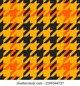 Goose foot. Halloween Pattern of crow's feet in orange, black and yellow cage. Glen plaid. Houndstooth tartan tweed. Dogs tooth. Scottish cage. Seamless fabric texture. Vector illustration