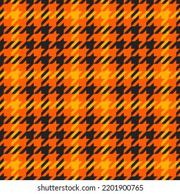 Goose foot. Halloween Pattern of crow's feet in orange, black and yellow cage. Glen plaid. Houndstooth tartan tweed. Dogs tooth. Scottish cage. Seamless fabric texture. Vector illustration