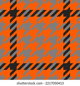 Goose foot. Halloween Pattern of crow's feet in orange, black and gray cage. Glen plaid. Houndstooth tartan tweed. Dogs tooth. Scottish cage. Seamless fabric texture. Vector illustration