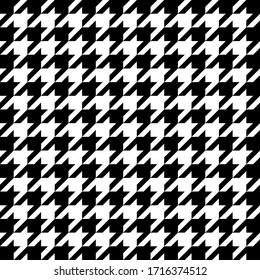 Goose foot. Pattern of crow's feet in black and white cage. Glen plaid. Houndstooth tartan tweed. Dogs tooth. Scottish checkered background. Seamless fabric texture. Vector illustration