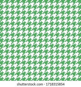 Goose foot. Pattern of crow's feet in red and white cage. Glen plaid. Houndstooth tartan tweed. Dogs tooth. Scottish checkered background. Seamless fabric texture. Vector illustration
