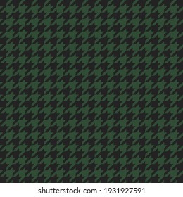 Goose foot. Pattern of crow's feet in black and green cage. Glen plaid. Houndstooth tartan tweed. Dogs tooth. Scottish checkered background. Seamless fabric texture. Vector illustration