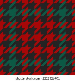 Goose foot. Pattern of crow's feet in black, red, green cage. Glen plaid. Houndstooth tartan tweed. Dogs tooth. Scottish checkered background. Seamless fabric texture. Vector illustration