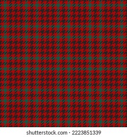 Goose foot. Pattern of crow's feet in black, red, green cage. Glen plaid. Houndstooth tartan tweed. Dogs tooth. Scottish checkered background. Seamless fabric texture. Vector illustration
