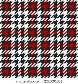 Goose foot. Pattern of crow's feet in black, red, white cage. Glen plaid. Houndstooth tartan tweed. Dogs tooth. Scottish checkered background. Seamless fabric texture. Vector illustration