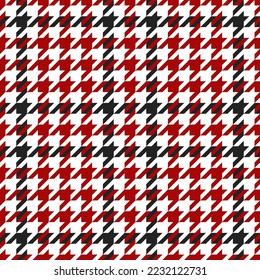 Goose foot. Pattern of crow's feet in black, red and white cage. Glen plaid. Houndstooth tartan tweed. Dogs tooth. Scottish checkered background. Seamless fabric texture. Vector illustration