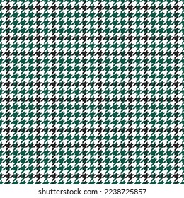 Goose foot. Pattern of crow's feet in black, green, white cage. Glen plaid. Houndstooth tartan tweed. Dogs tooth. Scottish checkered background. Seamless fabric texture. Vector illustration