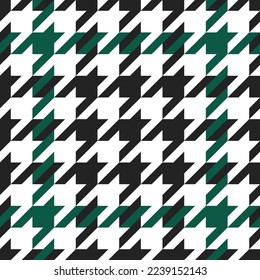 Goose foot. Pattern of crow's feet in black, green, white cage. Glen plaid. Houndstooth tartan tweed. Dogs tooth. Scottish checkered background. Seamless fabric texture. Vector illustration