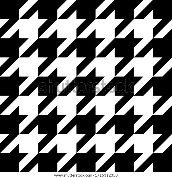 Goose foot. Pattern of crow\'s feet in black\
and white cage. Glen plaid. Houndstooth tartan tweed. Dogs tooth.\
Scottish checkered background. Seamless fabric texture. Vector\
illustration