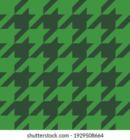 Goose foot. St. Patricks day pattern of crow's feet in green cage. Glen plaid. Houndstooth tartan tweed. Dogs tooth. Scottish checkered background. Seamless fabric texture. Vector illustration