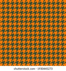 Goose foot. St. Patricks day pattern of crow's feet in green and orange. Glen plaid. Houndstooth tartan tweed. Dogs tooth. Scottish checkered background. Seamless fabric texture. Vector illustration