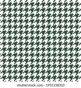 Goose foot. St. Patricks day pattern of crow's feet in green and orange. Glen plaid. Houndstooth tartan tweed. Dogs tooth. Scottish checkered background. Seamless fabric texture. Vector illustration