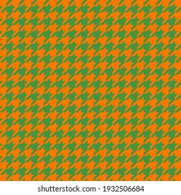 Goose foot. St. Patricks day pattern of crow's feet in green and orange. Glen plaid. Houndstooth tartan tweed. Dogs tooth. Scottish checkered background. Seamless fabric texture. Vector illustration