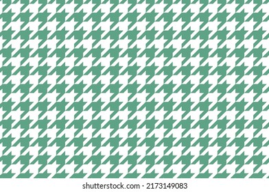 Goose foot. St. Patricks day pattern of crow's feet in green and white. Glen plaid. Houndstooth tartan tweed. Dogs tooth. Scottish checkered background. Seamless fabric texture. Vector illustration