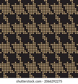 Goosefoots seamless pattern from small golden hearts on a black background. Hounds tooth halftone print, chicken feet, pied-de-poule pattern