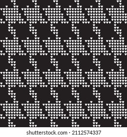 Goosefoots seamless pattern from small white hearts on a pink red background. Hounds tooth halftone print, chicken feet, pied-de-poule pattern