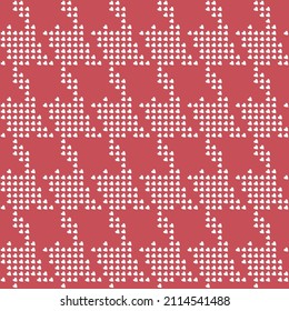 Goosefoots seamless pattern from small white hearts on a pink red background. Hounds tooth halftone print, chicken feet, pied-de-poule pattern