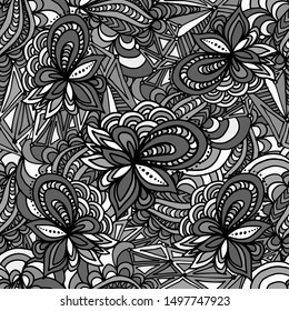 Gorgeous hand drawn seamless pattern with beautiful floral elements and geometric ornaments. Vector flowers and crystals in black and white tones. Perfectly for interior design, wallpaper, fashion. 