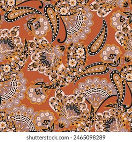Gorgeous paisley seamless vector pattern with fantastic flowers and leaves. Bohemian textile print inspired by batik. Vintage style