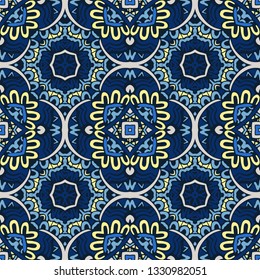 Gorgeous seamless patchwork pattern from blue and white oriental tiles, ornaments. Can be used for wallpaper, backgrounds, decoration for your design, ceramic, page fill and more.