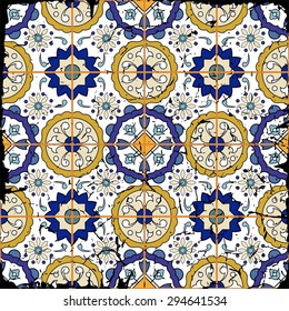 Gorgeous seamless patchwork pattern from grunge Moroccan tiles, ornaments. Can be used for wallpaper, pattern fills, web page background, surface textures. Grunge effects can be removed.