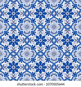 Gorgeous seamless pattern from dark blue and white Moroccan, Portuguese tiles, Azulejo, ornaments. Can be used for wallpaper, pattern fills, web page background,surface textures