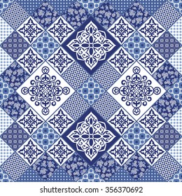 Gorgeous seamless pattern from dark blue  Moroccan tiles, ornaments. Vector patchwork pattern with geometric and floral  ornaments. 