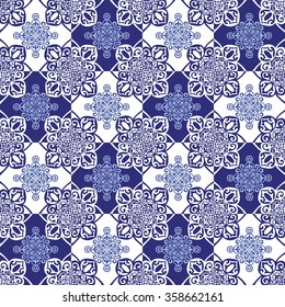 Gorgeous seamless pattern from dark blue  Moroccan tiles, ornaments. Vector patchwork pattern with geometric and floral  ornaments. 
