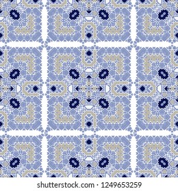 Gorgeous seamless pattern white blue orange Moroccan, Portuguese tiles, Azulejo, ornaments. Can be used for wallpaper, pattern fills, web page background,surface textures. Vector illustration