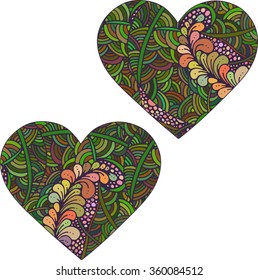 Gorgeous silhouettes of heart made of doodle elements, lines, swirls and leaves. Isolated ethnic hand drawn stylized floral heart. Fancy isolated pattern. Zen tangle. Vector background