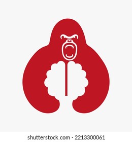 Gorilla Brain Logo Negative Space Concept Vector Template. Gorilla Holding Brain Symbol