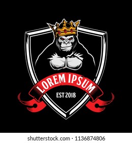 gorilla with a crown and shield vector badge logo template