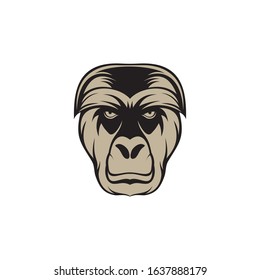 Gorilla head gold logo element. On black background.