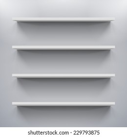 Gorizontal  white shelves on the gray wall